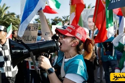 ببینید| رسوایی در مونیخ؛ پذیرایی با «آب دهان» و «فحاشی»، پاداش پرچمداری اسرائیل برای براندازان!+ ویدیو