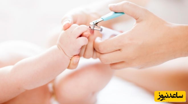 کوتاه کردن ناخن نوزاد با ناخن گیر