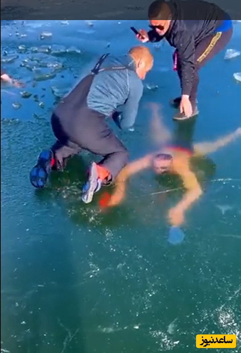(فیلم) گیرافتادن یک شناگر زیر یخ در دریاچه یخ زده 😱😱😱 / خب مجبوری مگه؟