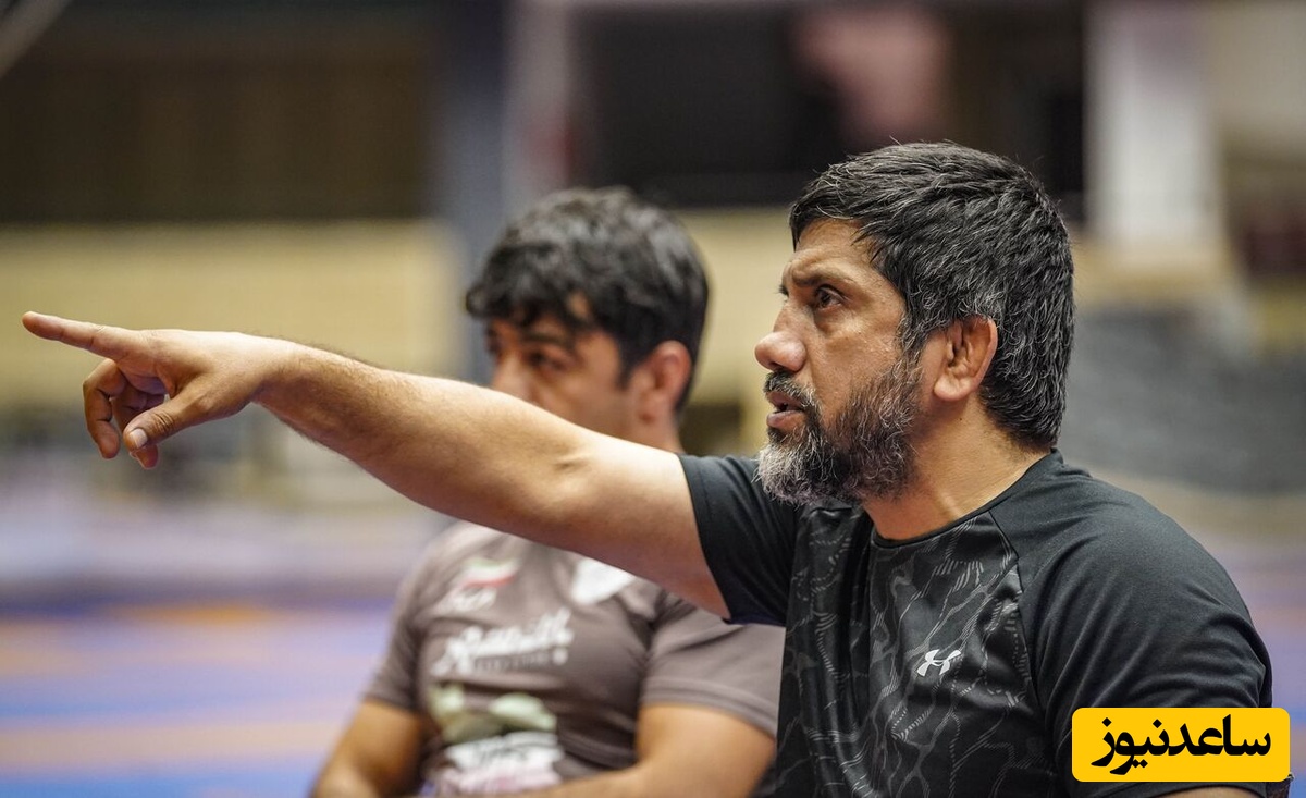 رویارویی علیرضا دبیر با یک سلطنت‌طلب در مسابقات جهانی کشتی و نصحیتهای جالبش: پاشو خجالت بکش پولی چیزی میخوای خودم بهت میدم...+ویدیو
