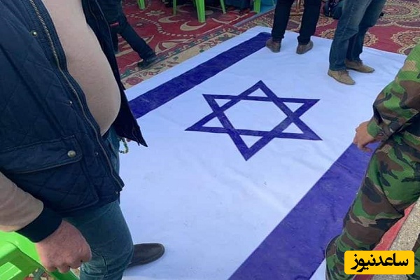 وقتی رهبر انقلاب رژیم صهیونیستی رو با یه قدم له کرد؛ پرچم اسرائیل زیر پای رهبری+عکس
