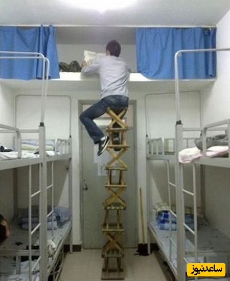 خلاقیت خنده دار جوان خوش ذوق ایرانی در نصب بنر و افزایش ارتفاع نردبان حماسه آفرید/ داداش تو حیفی، زودبیا پایین تا طوریت نشده😂