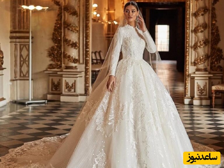 سنگین ترین لباس عروس دنیا از جنس کریستال های گرانبها که 182 کیلو وزن دارد! +عکس