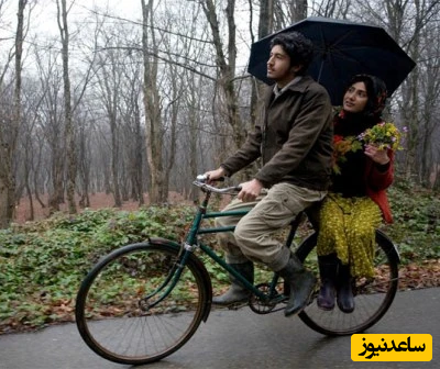(فیلم) سکانس عاشقانه باران کوثری و مهرداد صدیقیان/ دوچرخه سواری و تقدیم دسته گل زیر باران