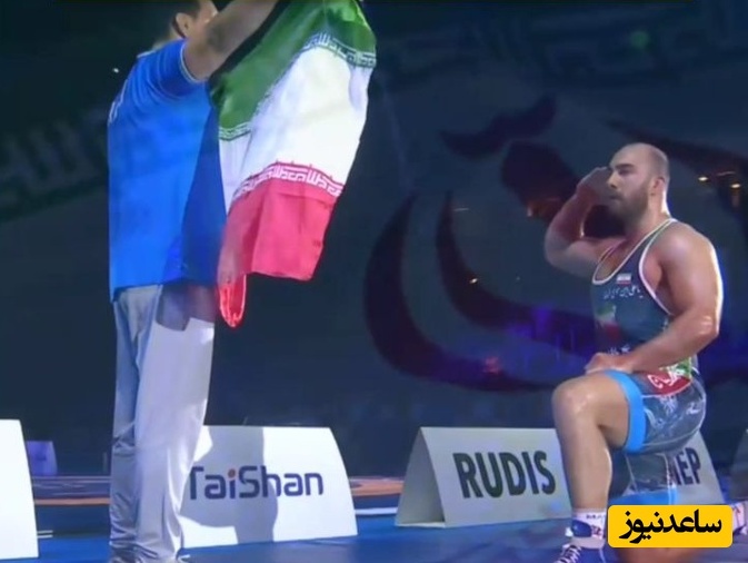 زارع با سلام نظامی کنار پرچم ایران، سنگین‌وزن جهان را به لرزه انداخت