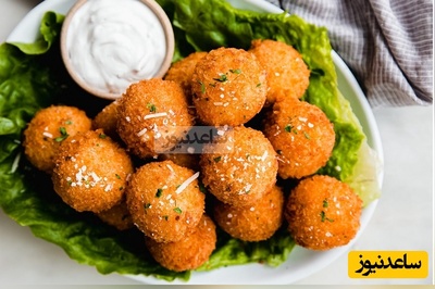 مطمئنم تا حالا توپک‌های سیب‌زمینی به این خوشمزگی نخوردی؛ طرز تهیه این توپک‌های خوشمزه با کمترین مواد ممکن در زمان کم+ویدیو