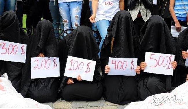 فروش زنان با غل و زنجیر در بازار برده‌فروشان توسط داعشی ها جنجال به پا کرد! +ویدئو