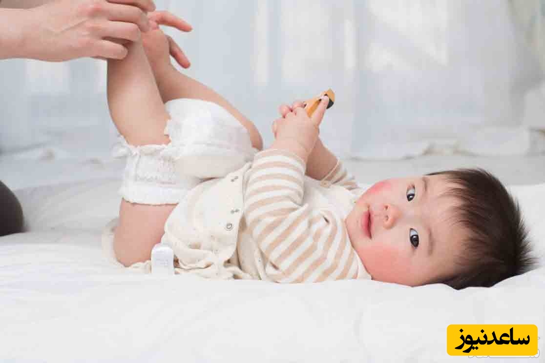 تعویض پوشک کودک هنگام خواب