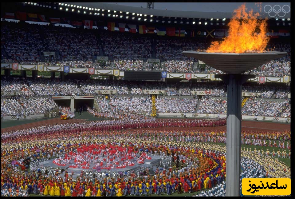 (فیلم 18+) زنده زنده کباب شدن کبوتران بیگناه بر روی مشعل المپیک 1988 کره جنوبی در مراسم افتتاحیه