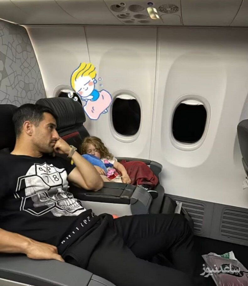 احسان حاج‌صفی و دخترش در هواپیما