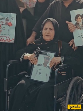 دستهای لرزان مادر شهید در جنگ رمضان/ چه بنویسیم از آن دست‌ها... از آن دست‌های لرزان که عکس پسر را چون پرچم وطن به دست گرفته+ ویدئو