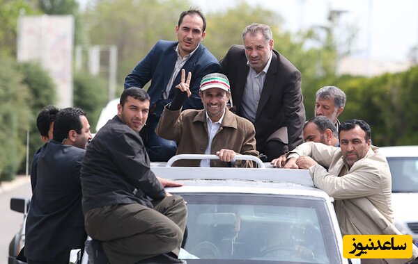 (فیلم) بالا رفتن یک زن از ماشین احمدی نژاد و محافظی که یه خم او را گرفت!