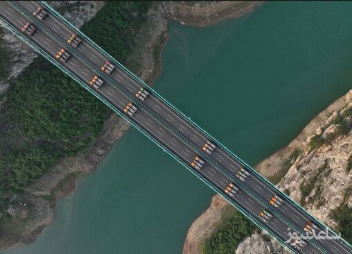 آزمایش عبور کامیون های حامل بار روی یک پل عظیم تازه تاسیس در چین/ گتی ایمجز