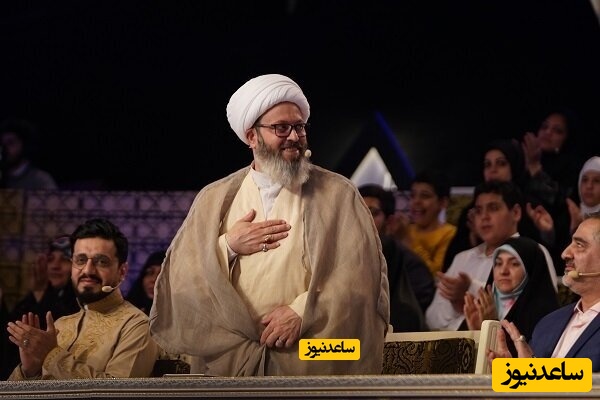 بوسه حجت الاسلام قاسمیان بر دستان پینه بسته پدر نابغه قرآنی + فیلم