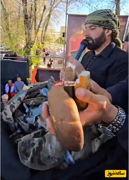 نمایش نان خشک، کوله‌پشتی و جلیقه نظامی متجاوزان آمریکایی در اصفهان؛ این نان در گلوی کسی می‌ماند که بخواهد به ایران تجاوز کند+فیلم