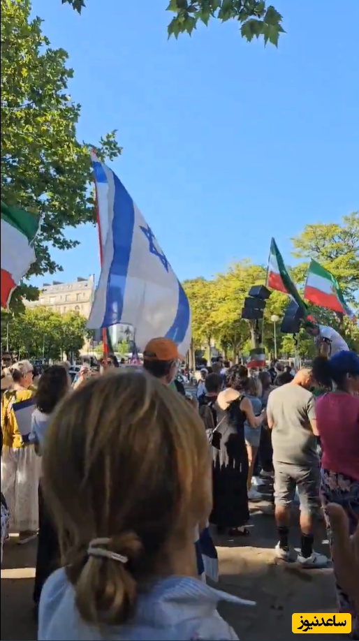 قِر دادن طرفداران رضا پهلوی زیر پرچم اسرائیل، وقتی نتانیاهو بر سر زنان و کودکان در ایران موشک می‌ریخت / کامنت آزاد، نظرات خود را حواله پسرِ فرح کنید!