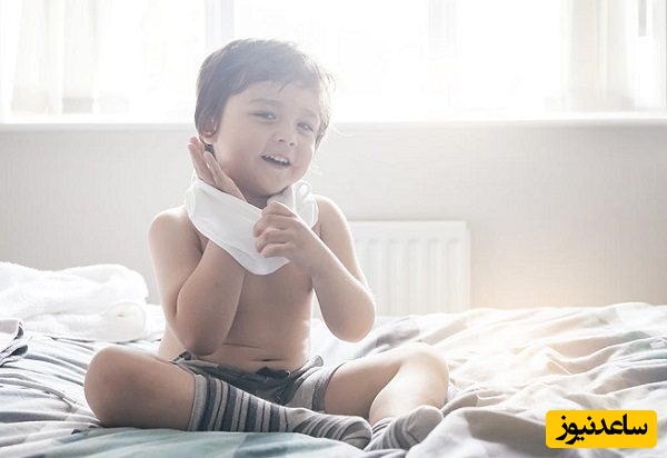 لجبازی کودک موقع لباس پوشیدن