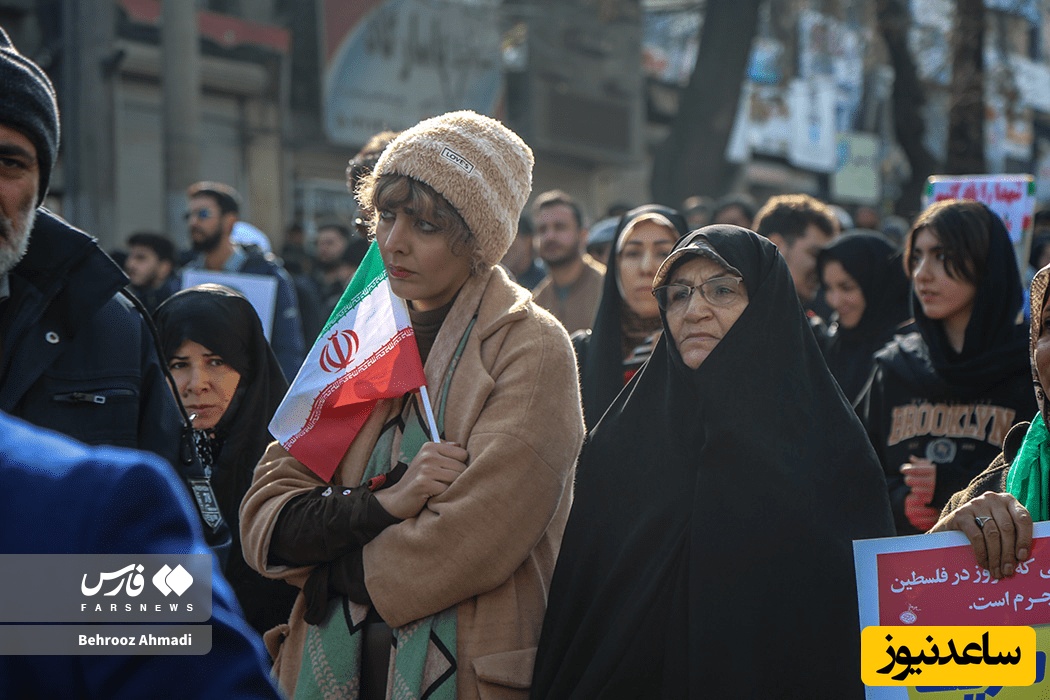 زنی با حجاب متفاوت در تشییع ملینا