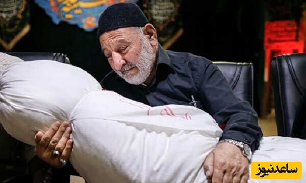 استقبال متفاوت و غرورآفرین یک پدر از فرزند شهیدش خبرساز شد +فیلم