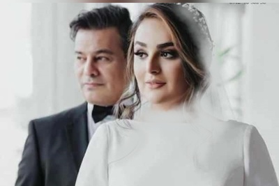 نگاهی به چیدمان جشن عروسی اروپایی پیمان قاسم خانی و همسر جوانش میترا ابراهیمی با دیزاین کیک 3 طبقه، شمع و...