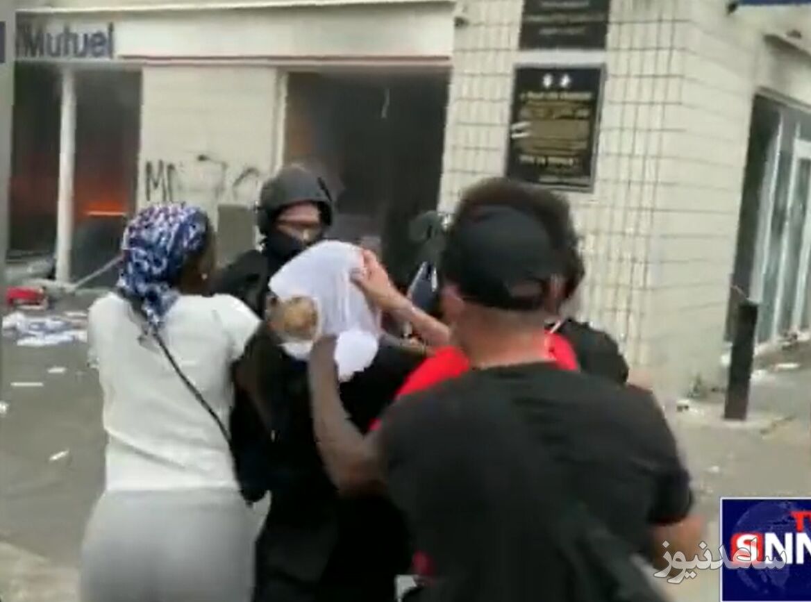 حمله پلیس فرانسه به زن محجبه و برداشتن حجاب از سر او +ویدئو