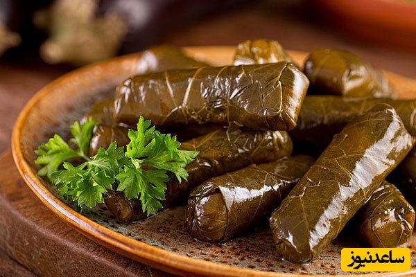 طرز تهیه دلمه برگ مو خوشمزه و اصیل برای ماه رمضان / سفره های این ماه رو با این غذا رنگین تر کن + ویدئو