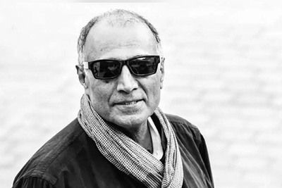 نگاهی به چیدمان منزل دوبلکس عباس کیارستمی در محله چیذر قبل از حملات آمریکا و اسرائیل/کتابخونه و پیانو، نقاشی آبستره، فرش اصیل ایرانی و...+فیلم