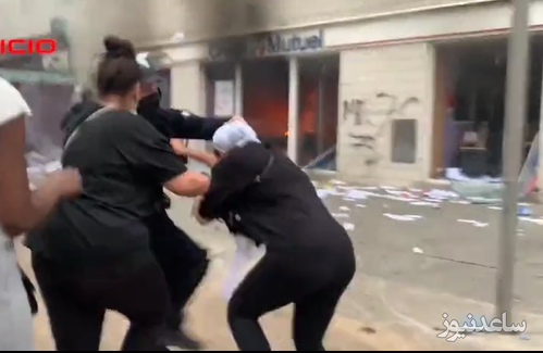 تعرض پلیس به زن جوان و کشیدن حجاب از سر او در اعتراضات فرانسه!!