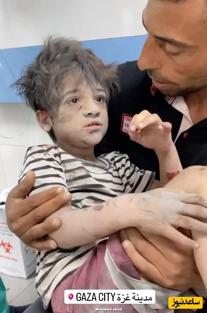(فیلم) شنیدید که میگن از ترس می لرزید؟ حالا ببینید: کودک فلسطینی نجات یافته از زیر آوار حملات اسرائیل از ترس می لرزد!