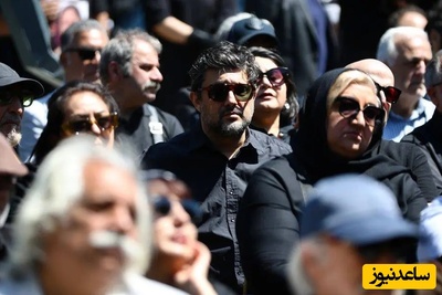 خوش و بش صمیمانه حامد کمیلی با حامد بهداد پیر پسر سینمای ایران در مراسم تشییع بهناز نازی +فیلم