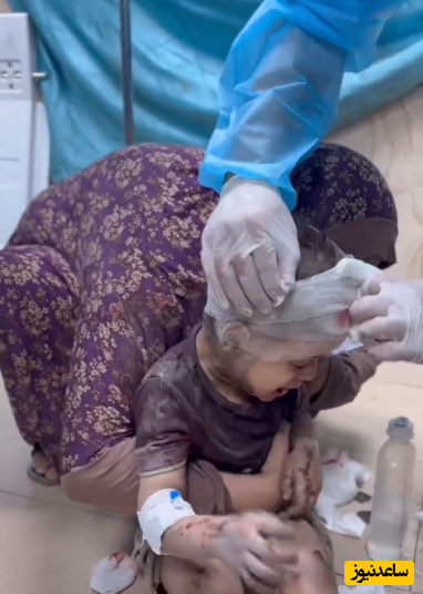(ویدئو) لرزش بدن کودک فلسطینی غرق خون در کف بیمارستان دل جهان را به درد آورد