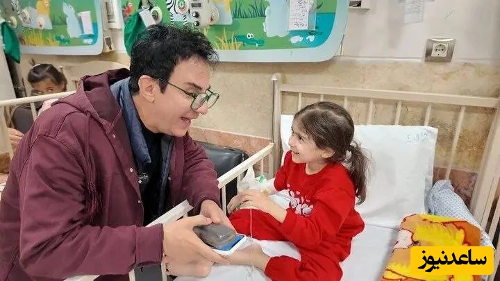 عمو پورنگ همیشه در کنار بچه‌ها حتی در جنگ+ تصاویر