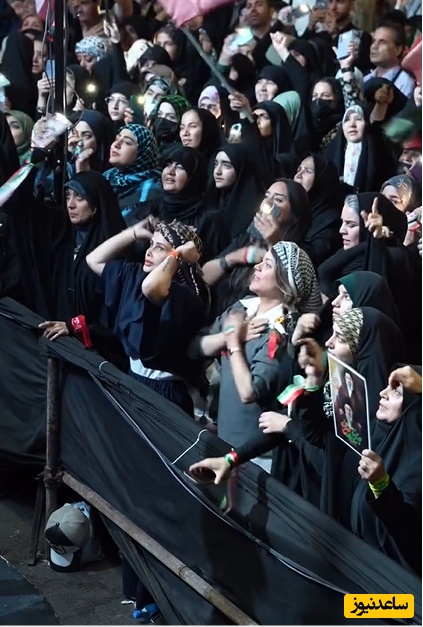 با هر حجاب و پوششی که داریم، پرچم ایران بر زمین نمی‌ماند+ویدیو