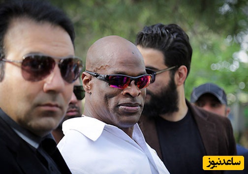 رونی کلمن، اسطوره مسترالمپیا با دسته گل صورتی سر مزار یک شهید ایرانی حاضر شد+عکس دیده نشده