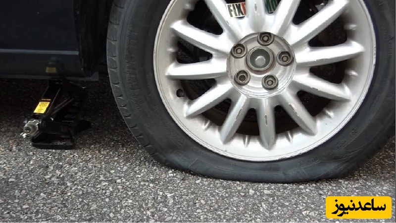 (عکس) آموزش ساده‌ترین و راحت‌ترین روش پنچرگیری و تعویض لاستیک ماشین