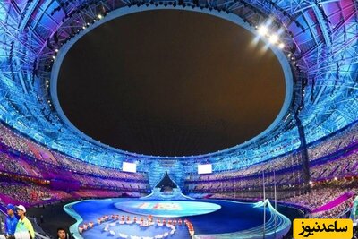 (ویدیو) رژه کاروان ایران در مراسم افتتاحیه بازیهای آسیایی در چین با پرچم‌داری ناهید کیانی و جواد فروغی