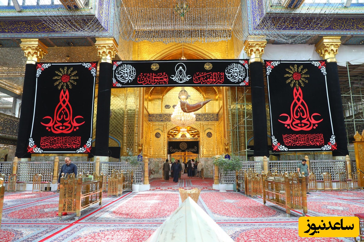 مراسم نصب کتیبه عزا بر ایوان طلای حرم امیرالمؤمنین برای استقبال از محرم