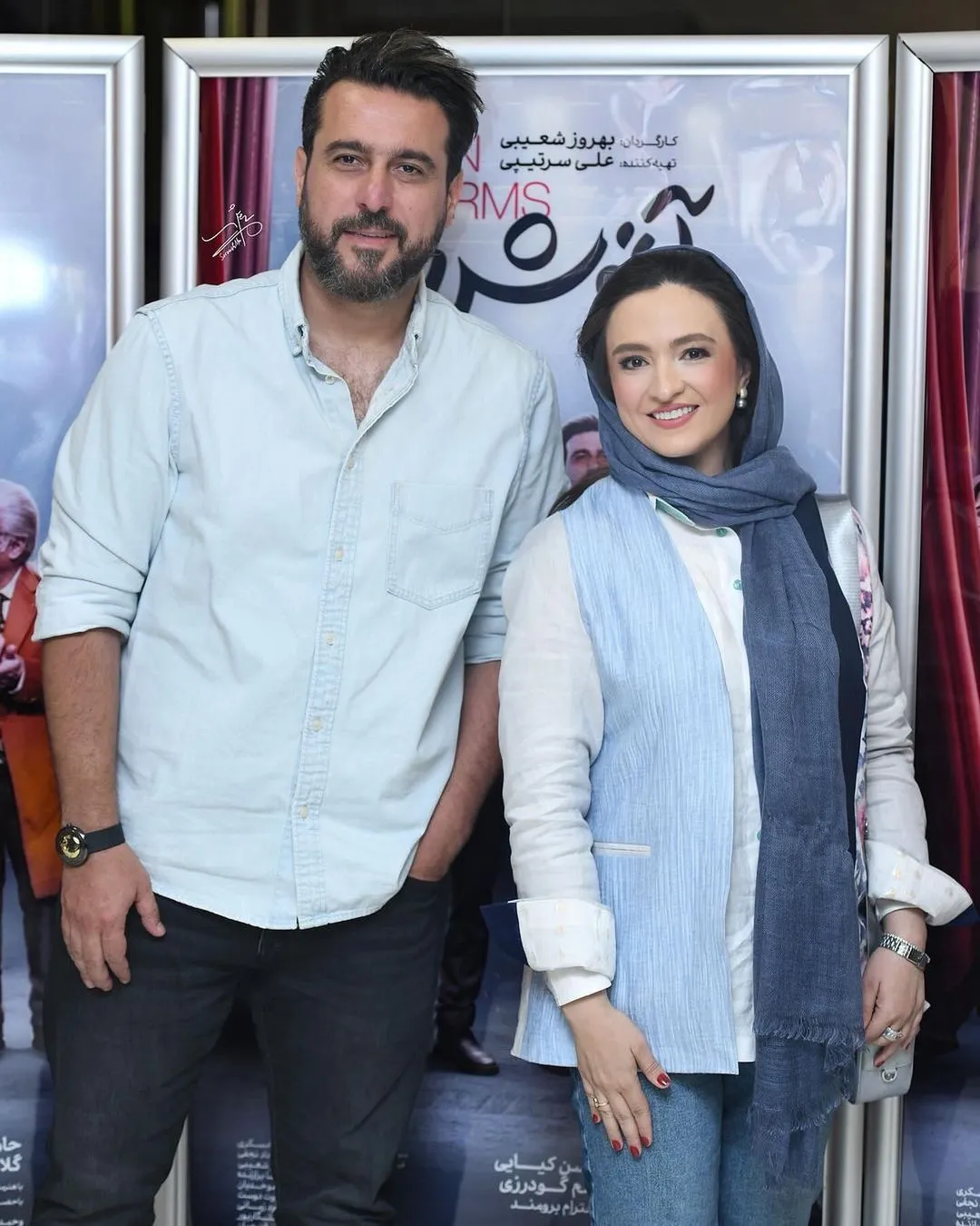 (عکس) محسن کیایی و گلاره عباسی در پشت صحنه فیلم سینمایی آغوش باز در کنار برج آزادی