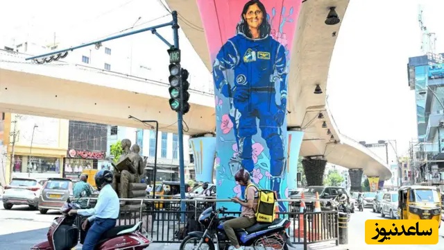 یک نقاشی دیواری بزرگ از فضانورد سونیتا ویلیامز با لباس فضایی آبیرنگ در یکی از شهرهای هند