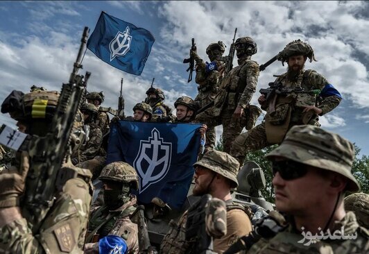 نیروهای "سپاه داوطلب روسیه" برای یک کنفرانس مطبوعاتی در نزدیکی مرز روسیه و اوکراین آماده می شوند./ رویترز