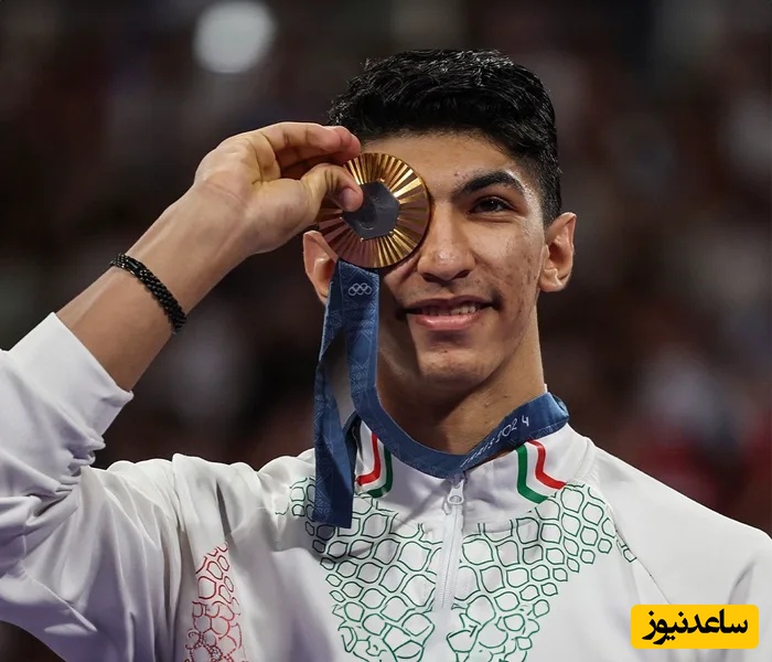 خلاقیت هوشمندانه آرین سلیمی، قهرمان المپیک برای استفاده از هدفون در تمرین/ با این طرز فکر معلومه همیشه برنده‌ای+عکس