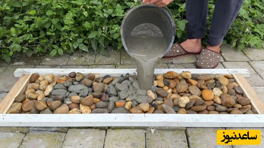 خلاقیت تحسین برانگیز یک هنرمند چینی برای ساخت گلدان با سیمان و سنگ ریزه+ ویدئو