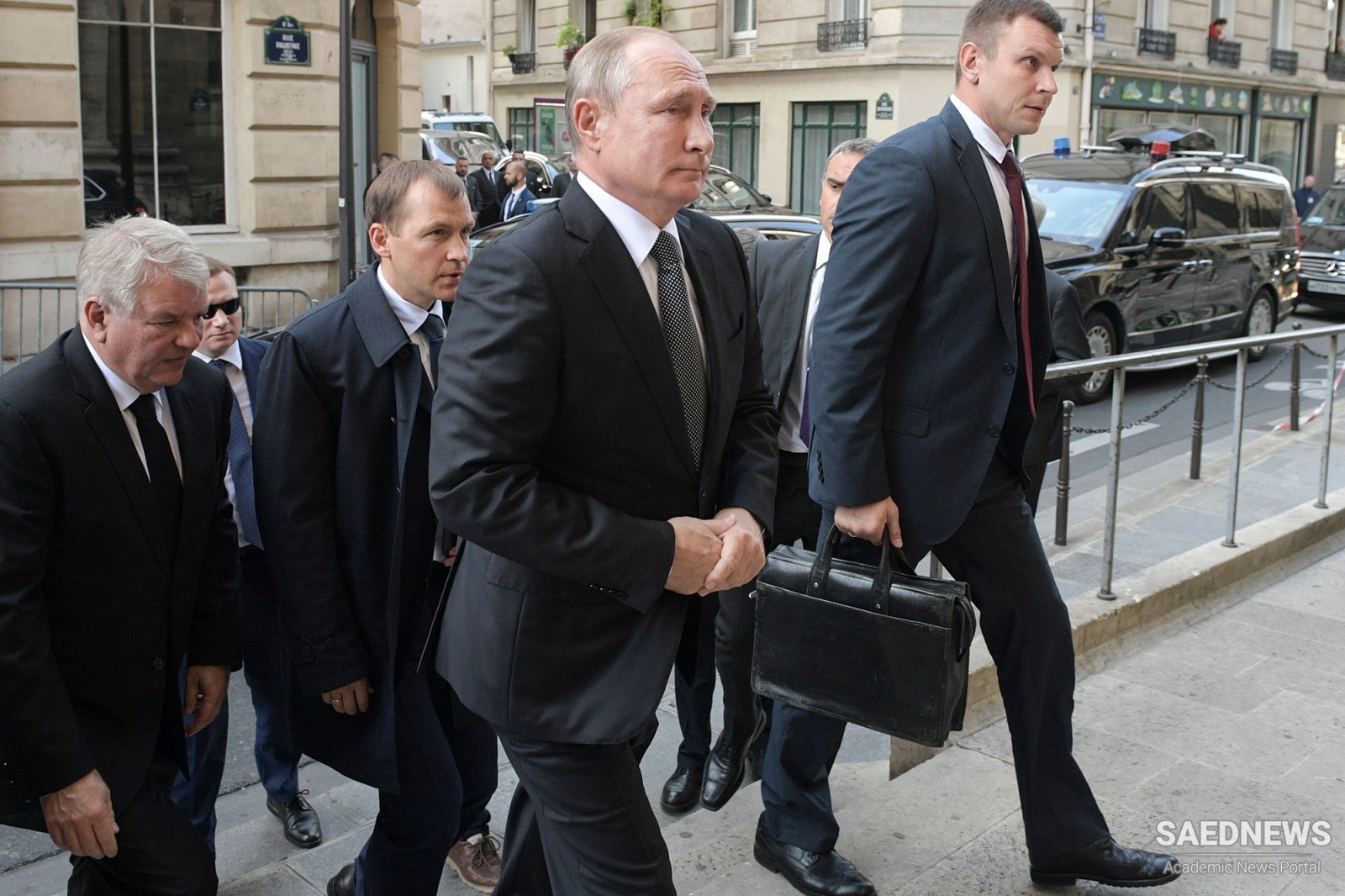 Putin triggers fears of nuclear war by showing up to funeral with secret case