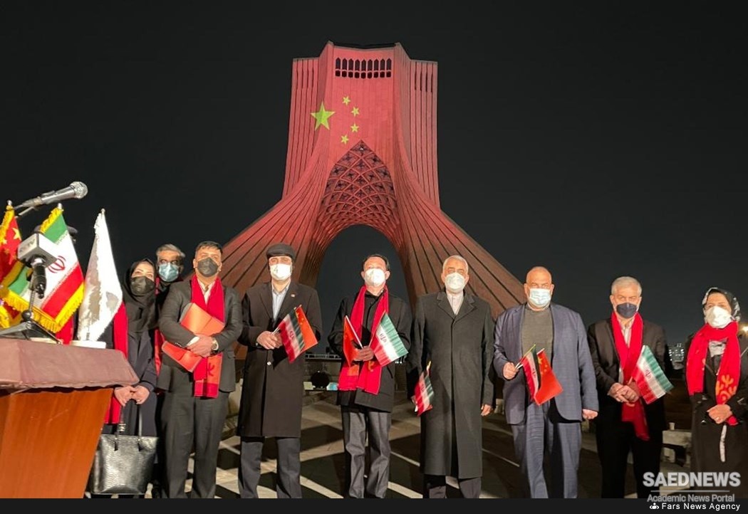 Iran's Azadi Tower Flashes Red for Chinese New Year