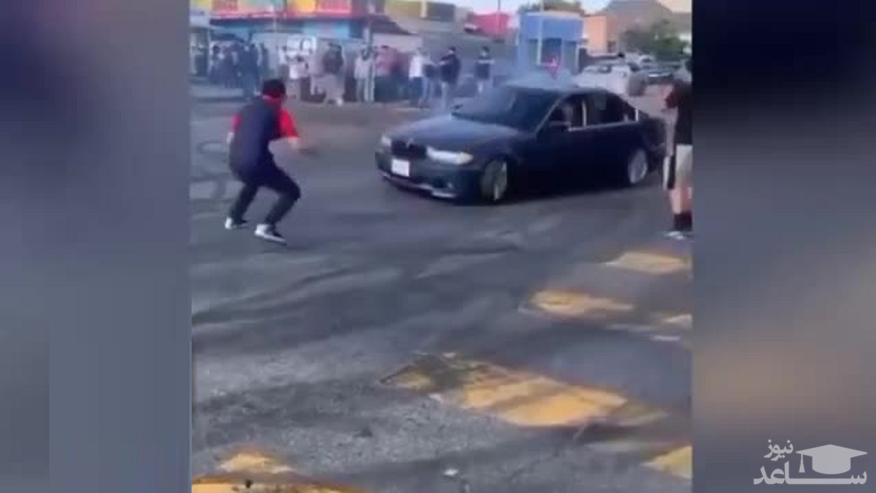 (فیلم) له شدن یک مرد، هنگام انجام حرکات نمایشی یک خودروی سواری