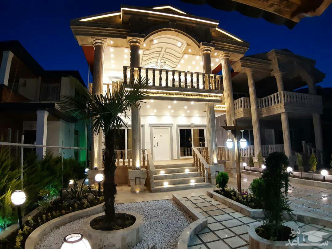 (عکس) ساخت عمارتی مجلل در میان شالیزار