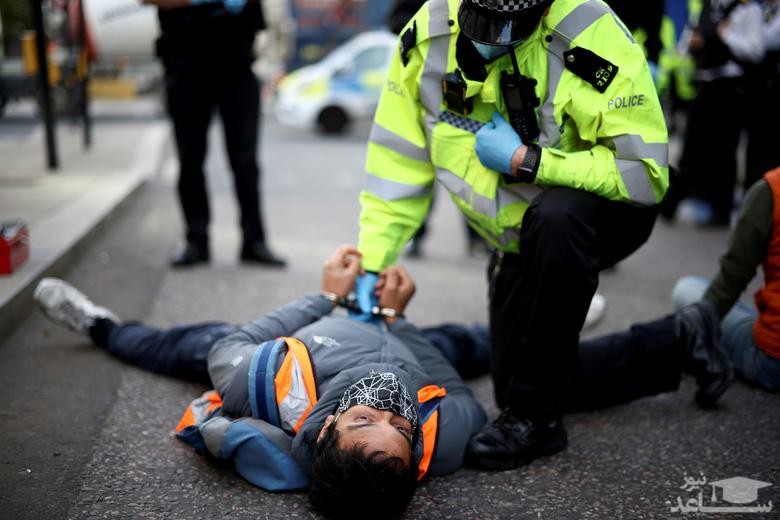 دستگیری فعالان معترض در جریان تظاهراتی در شهر لندن/ رویترز