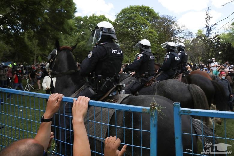 تنش و درگیری بین بی خانمان ها و پلیس شهر تورنتو 