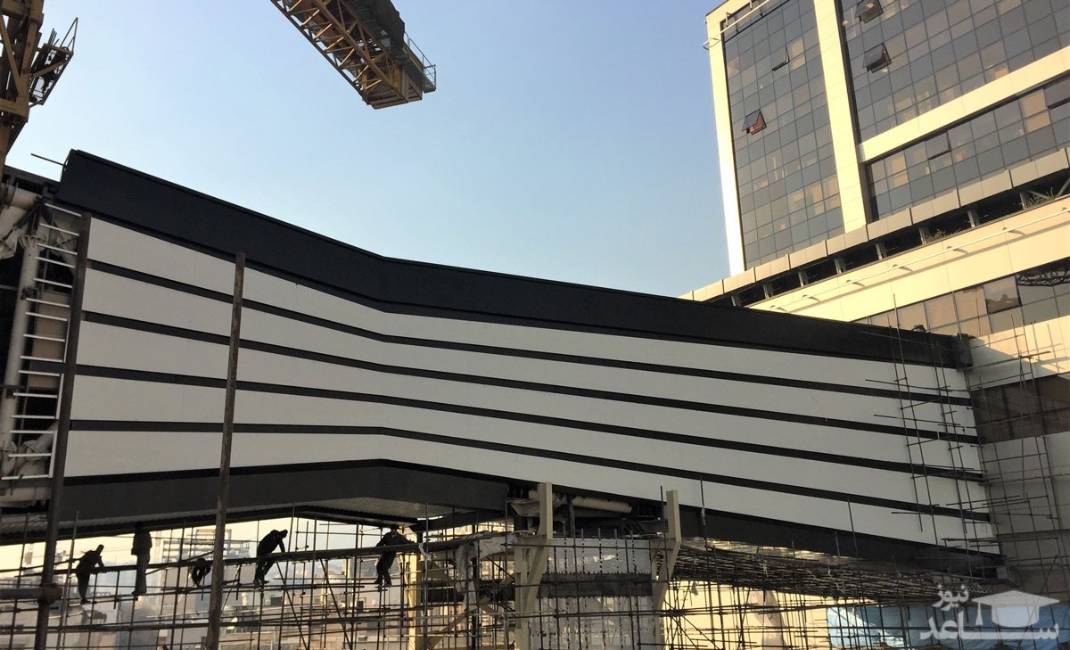 (فیلم) درگیری و شلیک تیر هوایی توسط پلیس در تخریب پل غیرمجاز ساختمان پالادیوم