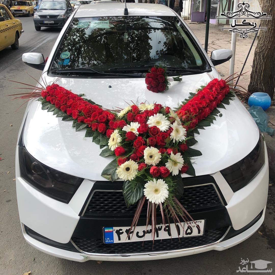 (عکس)  ماشین عروس مزین به تصویر شهید سلیمانی